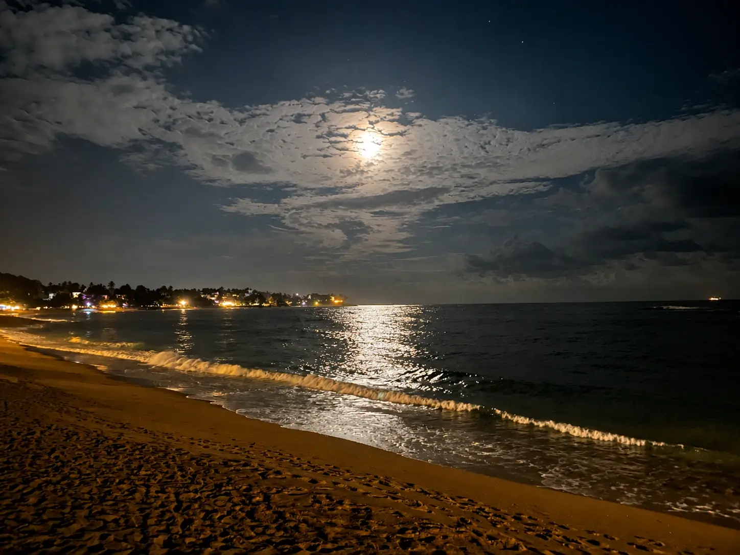 Moonlit beach and ocean view near Kamayan Beach Restaurant